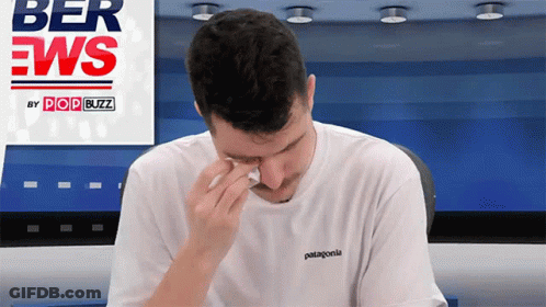 Man In Patagonia T-Shirt Crying GIF