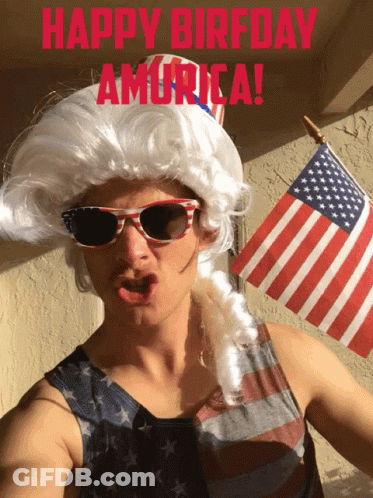 Man In Patriotic Wig And Sunglasses Holding American Flag GIF