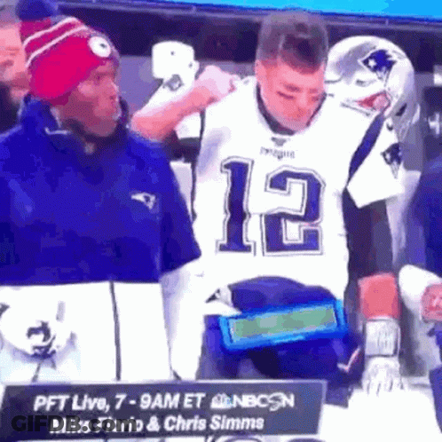 Man In Patriots Jersey Next To Man With Hat GIF
