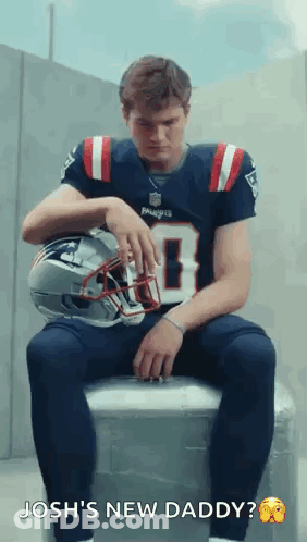 Man In Patriots Jersey Sitting On Cooler With Helmet GIF
