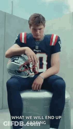 Man In Patriots Jersey Sitting On Cooler With Helmet GIF