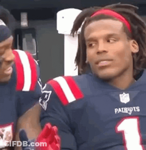 Man In Patriots Jersey Talking To Football Player GIF