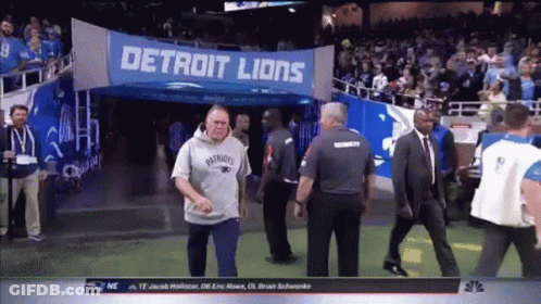 Man In Patriots Sweatshirt At Detroit Lions Entrance GIF