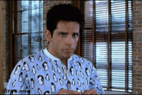 Man In Penguin Shirt Standing GIF