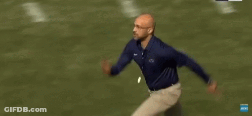 Man In Penn State Shirt Running On Field GIF