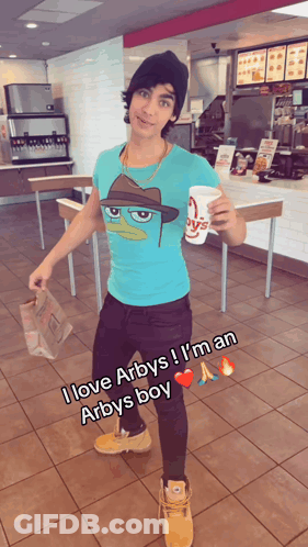 Man In Perry The Platypus Shirt Holding Cup Of Arby's GIF