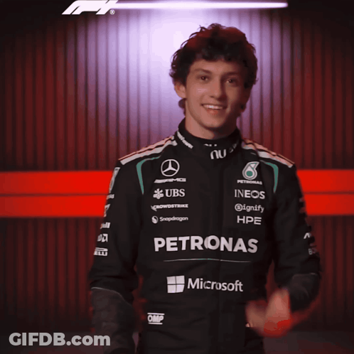 Man In Petronas Jacket With Microsoft GIF
