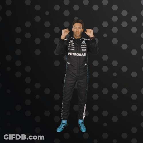 Man In Petronas Racing Suit Giving Thumbs Up GIF