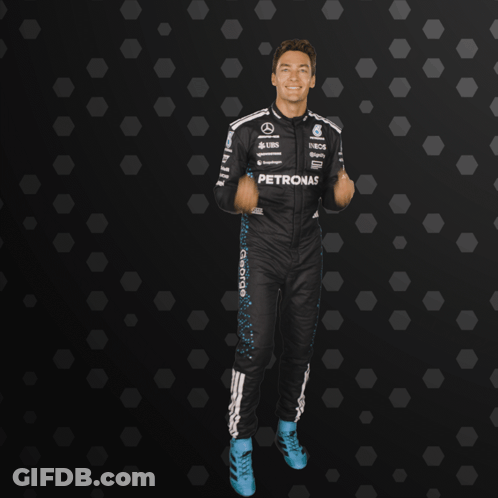 Man In Petronas Suit With Hands Outstretched GIF