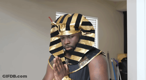 Man In Pharaoh Costume Hands Folded GIF
