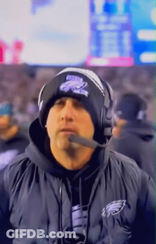 Man In Philadelphia Eagles Hat Talking Into Microphone GIF