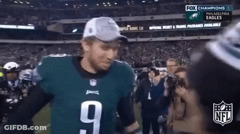 Man In Philadelphia Eagles Jersey And Hat On Football Field GIF