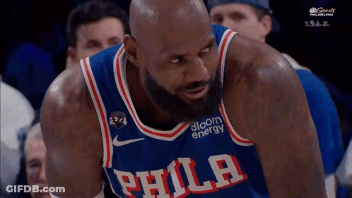 Man In Philadelphia Jersey Looking Down GIF