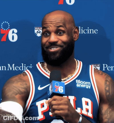 Man In Philadelphia Jersey Talking Into Microphone GIF
