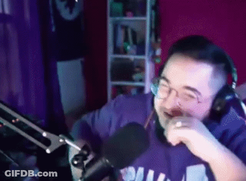 Man In Philadelphia Shirt With Headphones GIF