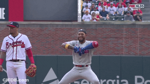 Man In Phillies Jersey On Baseball Field GIF