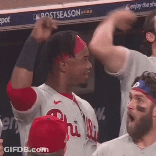 Man In Phillies Jersey Raising Fist GIF