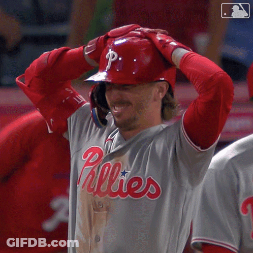 Man In Phillies Uniform Hands Behind Head GIF