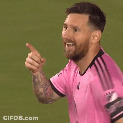 Man In Pink Adidas Shirt With Crown GIF