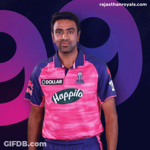 Man In Pink And Blue Shirt With Dollar Logo GIF
