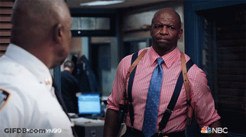 Man In Pink And Blue Striped Shirt Talking GIF