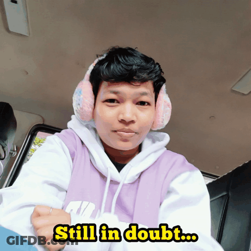 Man In Pink Ear Muffs And Purple Nike Hoodie GIF