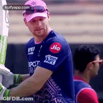 Man In Pink Hat And Sunglasses Holding Cricket Bat GIF