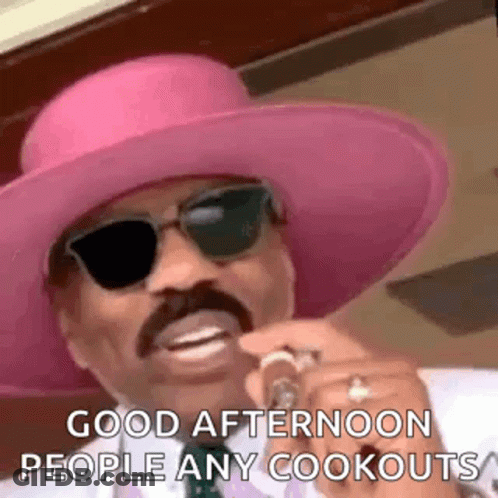 Man In Pink Hat And Sunglasses Holding Microphone GIF