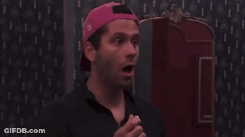 Man In Pink Hat Eating Food GIF