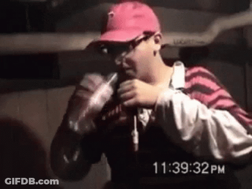 Man In Pink Hat Holding Coca Cola GIF