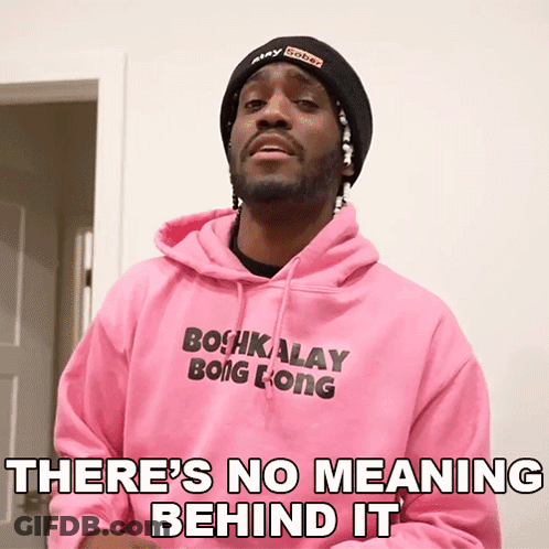 Man In Pink Hoodie And Black Beanie Saying There's No Meaning Behind It GIF