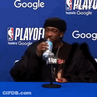 Man In Pink Hoodie Next To Man In Black Jacket GIF