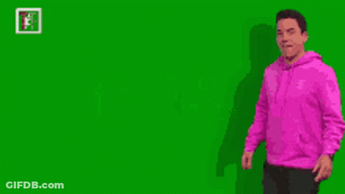 Man In Pink Hoodie Pointing At Green Screen GIF