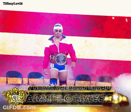 Man In Pink Jacket And Blue Shorts Next North American Champion GIF