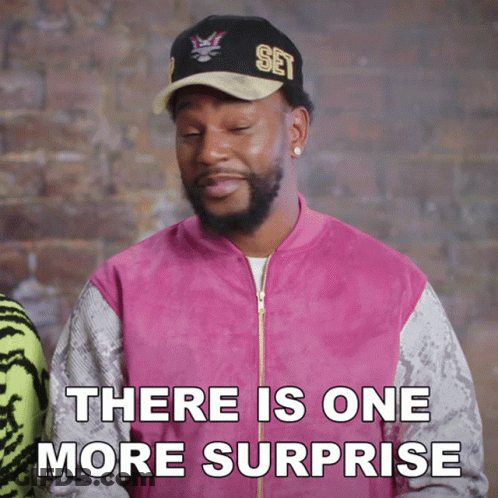 Man In Pink Jacket And Hat Says There Is One More Surprise GIF