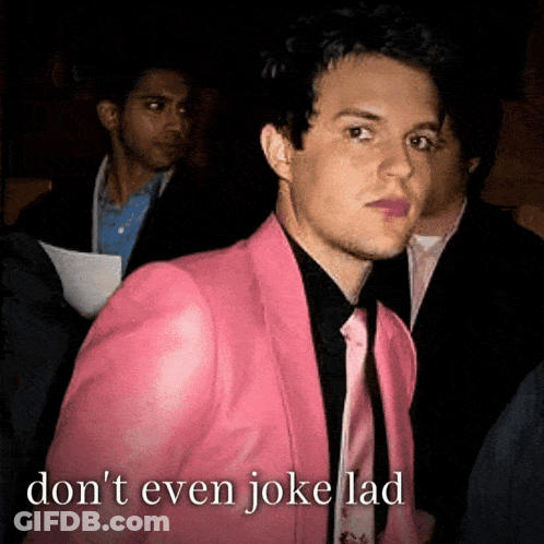 Man In Pink Jacket And Tie Says Don't Even Joke Lad GIF