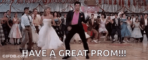 Man In Pink Jacket Dancing With Woman In White GIF