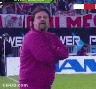 Man In Pink Jacket Soccer Field Power GIF