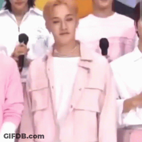 Man In Pink Jacket With Microphones GIF