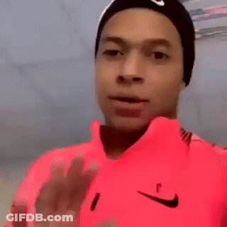 Man In Pink Nike Shirt And Black Nike Hat Making Funny Face GIF