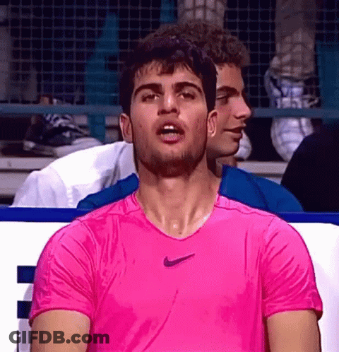 Man In Pink Nike Shirt Sweating GIF