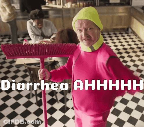 Man In Pink Outfit Holding Broom Saying Diarrhea Ahhhh GIF