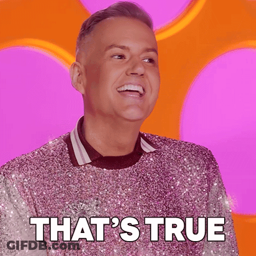 Man In Pink Sequined Sweater Smiling GIF