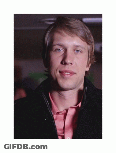 Man In Pink Shirt And Black Jacket GIF