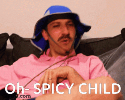 Man In Pink Shirt And Blue Hat Says Oh Spicy Child GIF