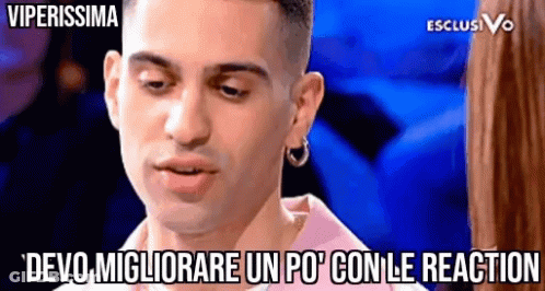 Man In Pink Shirt And Hoop Earrings Says Devo Migliorare Un Po Con Le Reaction GIF