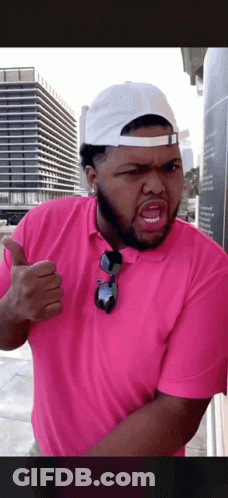 Man In Pink Shirt And White Hat Thumbs Up GIF