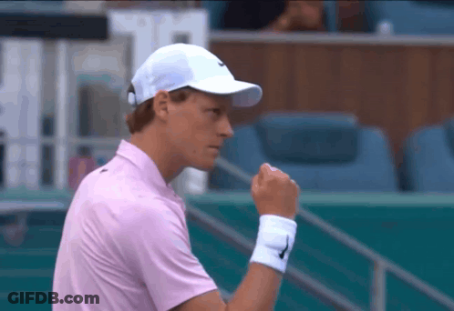 Man In Pink Shirt And White Hat With Nike Logo GIF