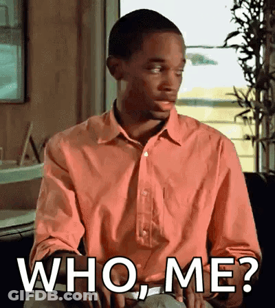 Man In Pink Shirt Asking Who Me GIF