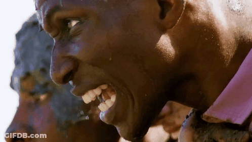 Man In Pink Shirt Drinking From Bucket GIF